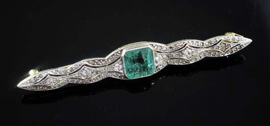 A gold and platinum, emerald and diamond set bar brooch, 59mm.